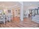 Elegant dining room featuring hardwood floors, modern chandelier, and open floor plan at 2812 Julian Glen Cir, Waxhaw, NC 28173