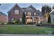 Beautiful two-story brick home with manicured landscaping and a welcoming front porch, offering great curb appeal at 2812 Julian Glen Cir, Waxhaw, NC 28173