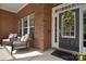 Cozy front porch with comfortable seating, perfect for relaxing and enjoying the outdoors at 2812 Julian Glen Cir, Waxhaw, NC 28173