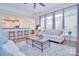 Spacious living room open to the kitchen featuring an eat in bar, hardwood floors and a fireplace at 2812 Julian Glen Cir, Waxhaw, NC 28173