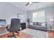 Cozy office space with a comfortable couch, modern desk, and plenty of natural light at 2812 Julian Glen Cir, Waxhaw, NC 28173