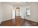 Bedroom with hardwood floors, large window, and paneled doors at 284 Garnet Ct, Fort Mill, SC 29708