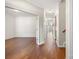 Inviting hallway with gleaming hardwood floors leads to various rooms at 284 Garnet Ct, Fort Mill, SC 29708