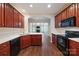 Bright kitchen with quartz countertops, dark cabinetry, and stainless appliances at 284 Garnet Ct, Fort Mill, SC 29708