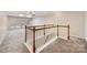 Loft area showcasing wood railings and open, airy space at 284 Garnet Ct, Fort Mill, SC 29708