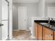 Bathroom featuring glass shower, neutral tiling, and a cherry vanity at 3038 Sterling Ct, Fort Mill, SC 29707