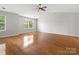 Bright bedroom with large windows, vaulted ceilings, and hardwood floors at 3038 Sterling Ct, Fort Mill, SC 29707