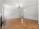 Spacious living room with a fireplace and large windows for lots of natural light at 3038 Sterling Ct, Fort Mill, SC 29707