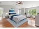 Spacious main bedroom with vaulted ceilings, hardwood floors, and stylish decor at 3038 Sterling Ct, Fort Mill, SC 29707