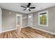 Bedroom view with new hardwood floors, neutral paint and a ceiling fan at 320 E Pine St, Maiden, NC 28650