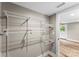 Bedroom closet with white wire shelving and wood-look flooring at 320 E Pine St, Maiden, NC 28650