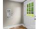 Convenient laundry hookups near the back door and window for natural light at 320 E Pine St, Maiden, NC 28650