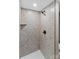 Updated tiled shower with bronze fixtures at 320 E Pine St, Maiden, NC 28650