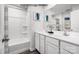 Pristine bathroom with double sinks, white cabinetry, and a shower-tub combination at 3233 Dannelly Towns Aly # 1002C, Charlotte, NC 28208