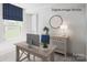 Comfortable office featuring desk, modern decor, and an inviting atmosphere for work at 3233 Dannelly Towns Aly # 1002C, Charlotte, NC 28208