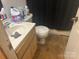 Bathroom shows a basic sink and toilet, featuring a dark shower curtain at 3234 Legend Rd, Lancaster, SC 29720