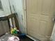 Exterior shot shows a white painted door and broom on the porch at 3234 Legend Rd, Lancaster, SC 29720