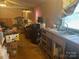 View of a living room with unfinished floors, cluttered with boxes and other items at 3234 Legend Rd, Lancaster, SC 29720