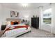 Cozy bedroom with modern furnishings, stylish bedding, and a serene outdoor view at 32562-B Millingport Rd # 7155, New London, NC 28127