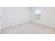 Bright bedroom with carpeted floor and a window allowing for natural light at 32562-B Millingport Rd # 7155, New London, NC 28127