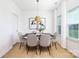 Dining room with modern table, chairs, light fixture and bright natural light at 32562-B Millingport Rd # 7155, New London, NC 28127
