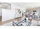 Inviting living area with stylish decor, showcasing a modern glass coffee table and elegant sideboard at 32562-B Millingport Rd # 7155, New London, NC 28127