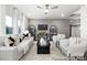 Spacious living room with large windows, stylish seating, and a modern entertainment setup at 32562-B Millingport Rd # 7155, New London, NC 28127