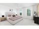 Comfortable main bedroom featuring a plush bed, large windows, and modern decor at 32562-B Millingport Rd # 7155, New London, NC 28127