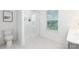 This bathroom features a glass enclosed shower, toilet, and white vanity at 32616 Millingport Rd # 7144, New London, NC 28127