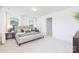 Bright bedroom with plush carpet, neutral tones, and natural light at 32616 Millingport Rd # 7144, New London, NC 28127