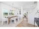 Open concept dining area features light-colored wood floors and direct access to the living room at 32616 Millingport Rd # 7144, New London, NC 28127