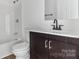 Bathroom with modern vanity, toilet, and shower/tub combo at 330 Willow Oak Cir, Lancaster, SC 29720