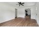 Bright living room with new floors and fresh paint, leading to the kitchen at 330 Willow Oak Cir, Lancaster, SC 29720