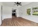 Bright living room boasts new floors, fresh paint, and a ceiling fan at 330 Willow Oak Cir, Lancaster, SC 29720