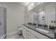 Modern bathroom featuring a double vanity, sleek fixtures, and glass-enclosed shower at 336 Uptown West Dr, Charlotte, NC 28208