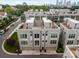 Exterior aerial view highlighting the home's contemporary design and convenient two-car garage at 336 Uptown West Dr, Charlotte, NC 28208