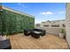 Private patio with stylish seating, green wall, and serene outdoor space at 336 Uptown West Dr, Charlotte, NC 28208