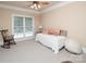 Bright room with a daybed, plush pillows, comfortable chair, large window, and soft carpet at 3504 High Ridge Rd, Charlotte, NC 29270