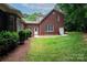 Well-maintained brick home with a neatly manicured lawn and mature landscaping, offering curb appeal at 3504 High Ridge Rd, Charlotte, NC 29270