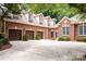 Brick home with three-car garage and expansive driveway at 3504 High Ridge Rd, Charlotte, NC 29270