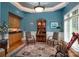 Elegant office with custom millwork, built-in bar, and hardwood floors at 3504 High Ridge Rd, Charlotte, NC 29270