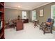 Comfortable office space with built-in bookshelves, a large window, and stylish furniture at 3504 High Ridge Rd, Charlotte, NC 29270