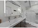 Bathroom features a modern double sink vanity and a walk-in shower with glass enclosure at 3528 Colony Rd # A, Charlotte, NC 28211