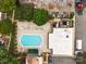 Aerial view showcases a sparkling community pool with plenty of lounge chairs, offering a refreshing outdoor oasis at 3528 Colony Rd # A, Charlotte, NC 28211