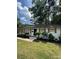 Charming single-story home with manicured front lawn and blue front door at 3700 Denson Pl, Charlotte, NC 28215