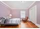 Cozy bedroom featuring hardwood floors, closet and natural light at 380 Woodlawn Ave, Cramerton, NC 28032