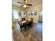 Dining area with a view into the kitchen and tiled floors at 380 Woodlawn Ave, Cramerton, NC 28032
