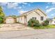 Well-kept single-story home with vinyl siding and a detached garage, complimented by lush landscaping at 380 Woodlawn Ave, Cramerton, NC 28032