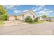 Cozy single-story home with vinyl siding and a detached garage, enhanced by mature landscaping at 380 Woodlawn Ave, Cramerton, NC 28032