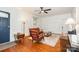 Inviting living room with hardwood floors, vintage furniture, and lots of natural light at 380 Woodlawn Ave, Cramerton, NC 28032